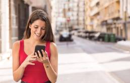 front-view-young-woman-holding-phone